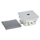 Flush-mounted floor empty housing with hinged cover
